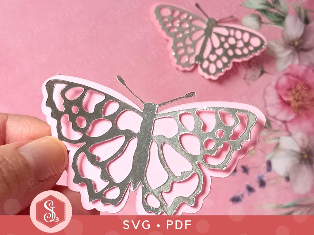 2 3D layered butterflies cut from paper